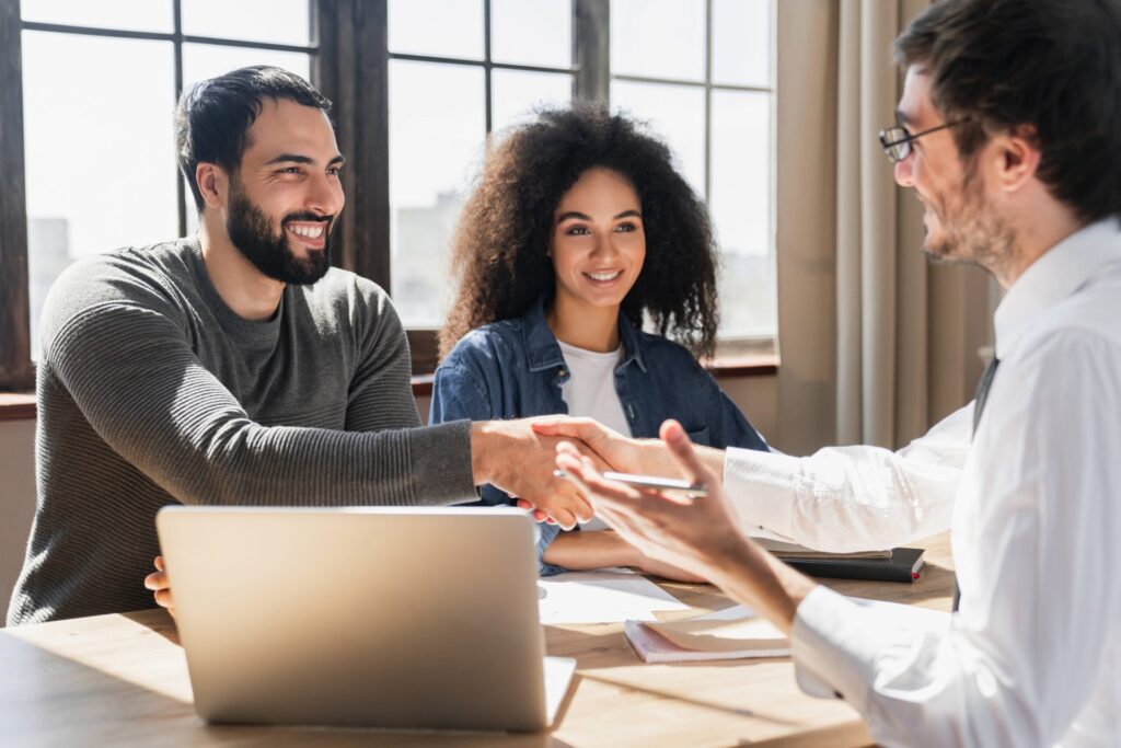 Couple meeting with a financial advisor.
