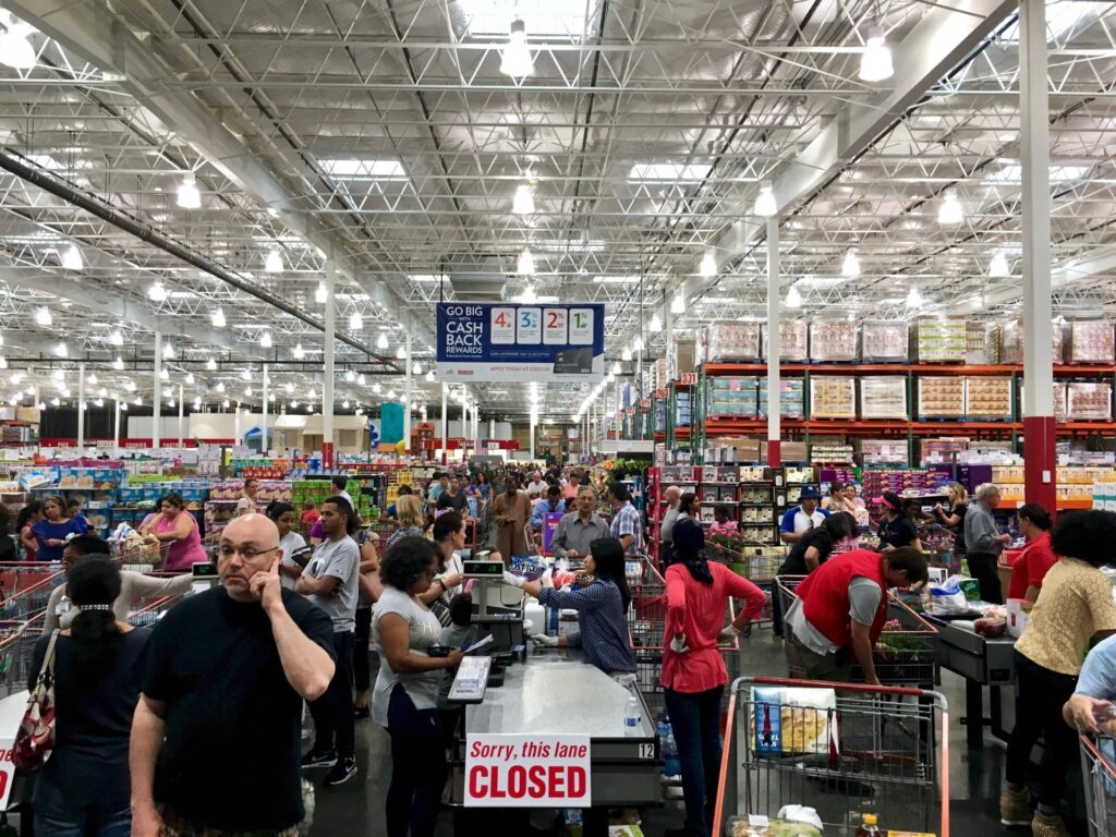 9 Costco Items That Waste Your Money Shoppers crowd a Costco warehouse store