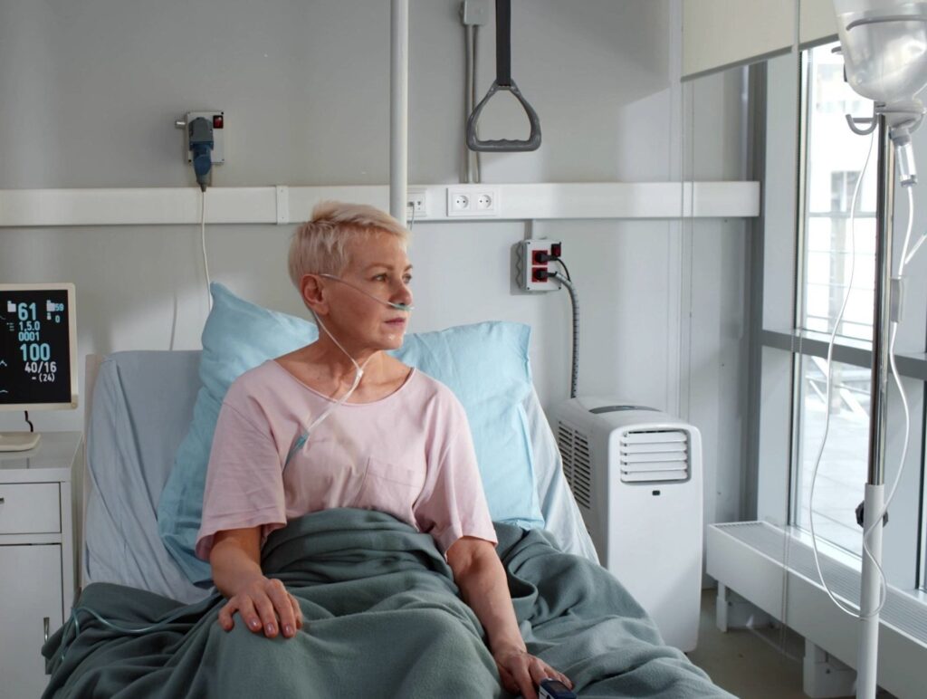 Woman in a hospital bed
