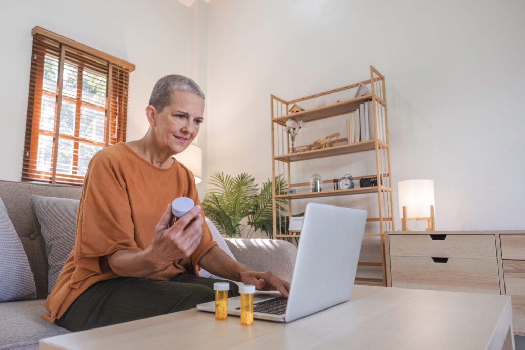 older woman buying prescription drugs online
