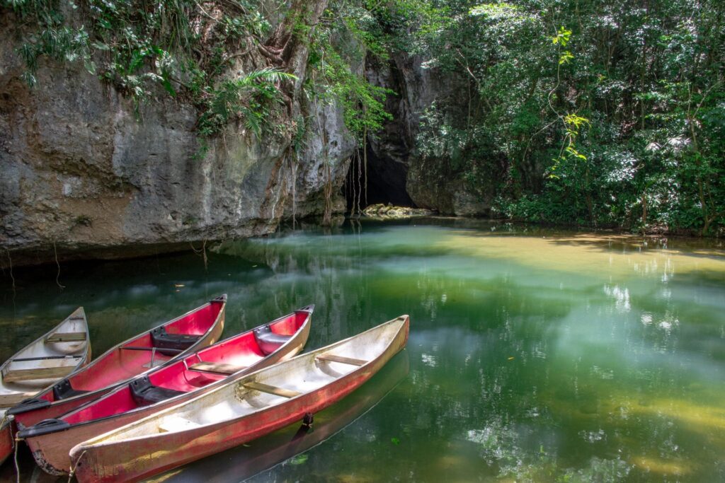 Canoes at the entrance to Barton Creek Cave in the Cayo District of Belize, Central America. The cave, near San Ignacio, is an important Mayan archaeological site.
