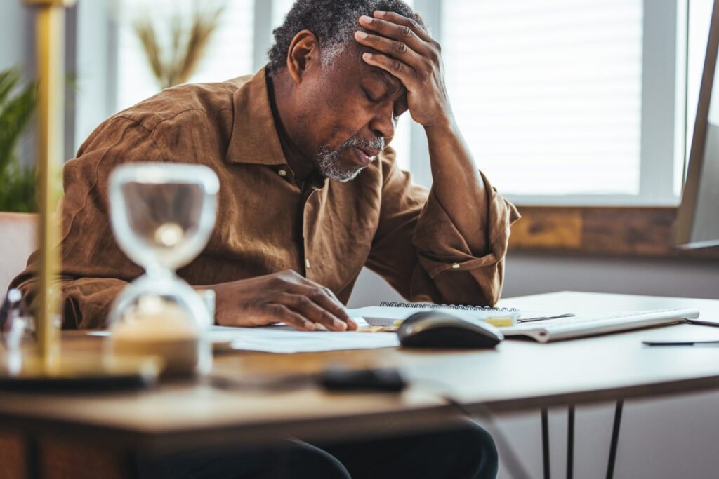 12 Things That Can Ding Your Social Security Payments Frustrated senior man looking at paperwork