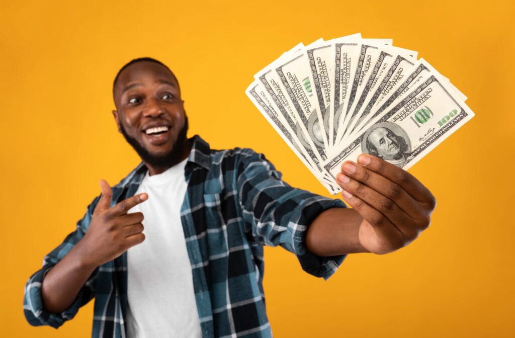 Happy man with money
