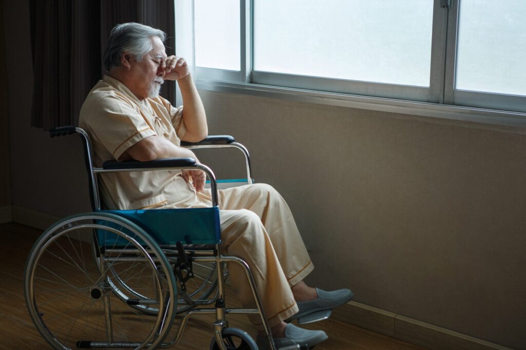 Worried senior in a wheelchair